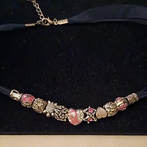 Gold-Tone Charm Necklace with Pink Accents